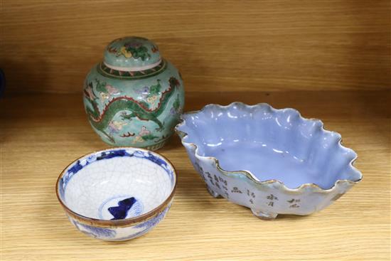 A Chinese ginger jar, height 15cm, an oval dish and a circular dish